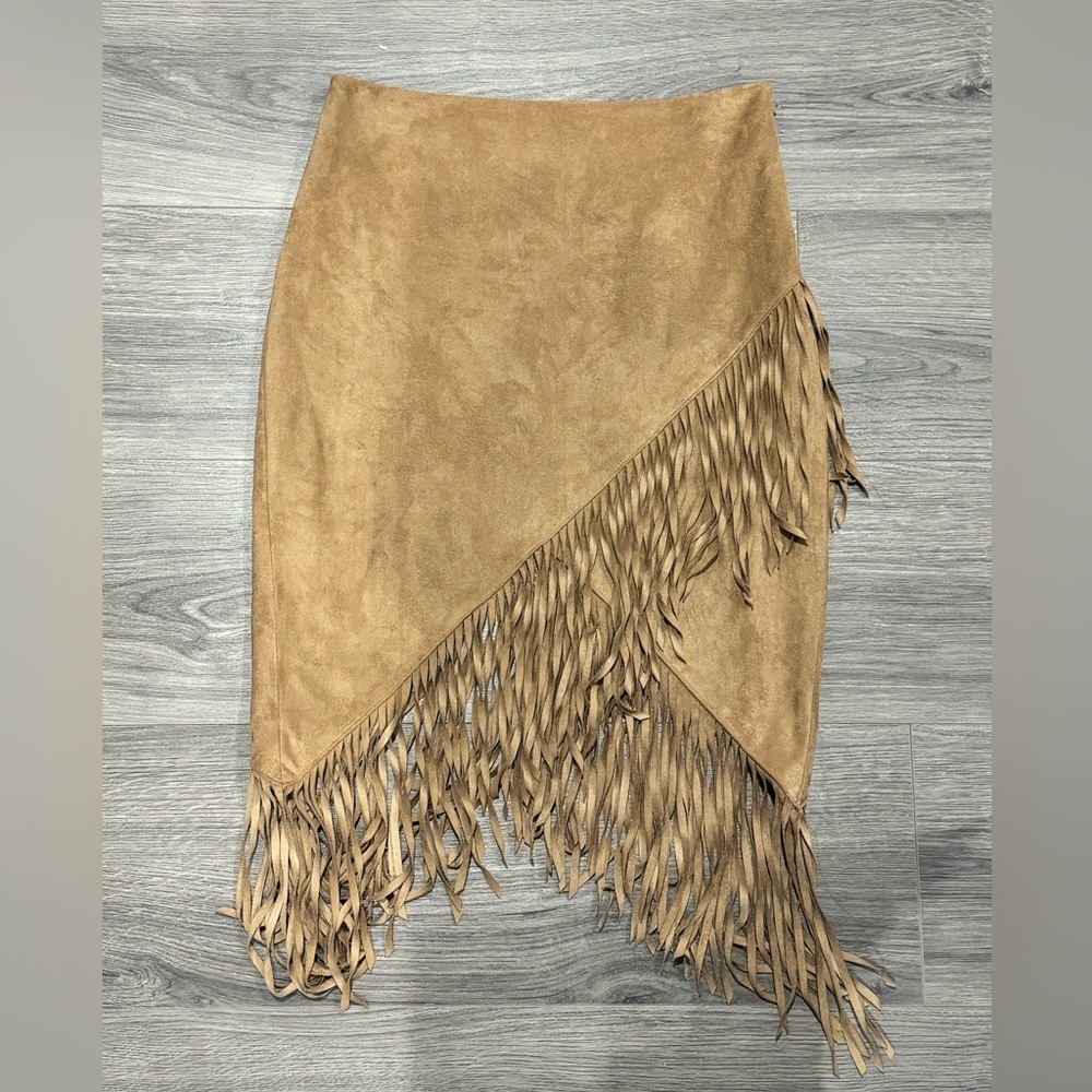 70’s inspired faux suede fringe skirt.